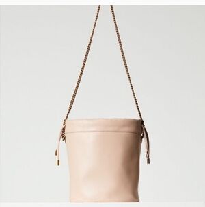 Aritzia Auxiliary Elegant Cream Drawstring Bag In EUC